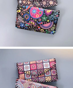 Detailed view of bohemian floral and geometric print shoulder bags with hand-woven borders