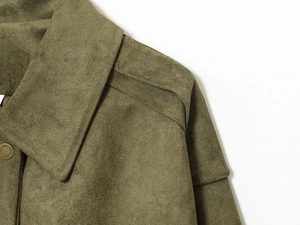 Close-up of olive green faux suede jacket showing collar detail and retro metal buttons