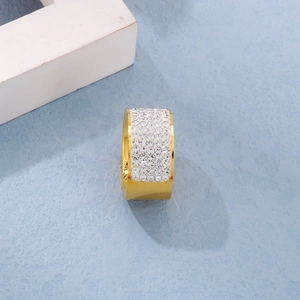 Detail view of 18k gold plated stainless steel wide ring with white cubic zirconia stones