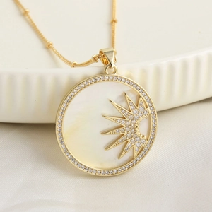 Vintage 18K gold plated sun and shell pendant necklace with sparkling zircon pavé detail