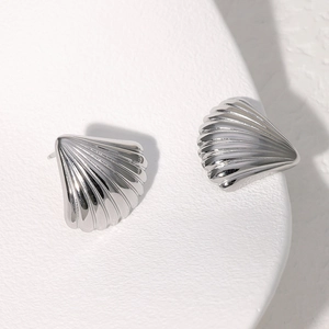 Polished silver shell stud earrings made of stainless steel with a minimalist 3D design