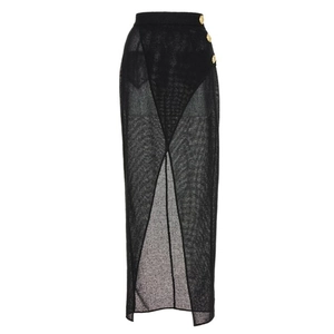 Close-up of black mesh maxi skirt featuring three decorative gold buttons and a side slit