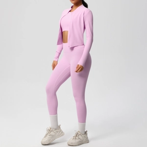 Detail of light pink 3-piece sports set featuring high waist leggings and a slim zip jacket