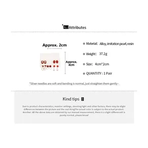 Detailed size specifications for red enamel heart and resin pearl earring set