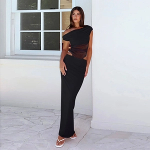 Detail showing off-the-shoulder mesh stitching and side waist hollow-out on black maxi dress