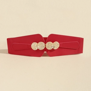 Detail view of red PU leather wide belt featuring an elegant gold double ring buckle