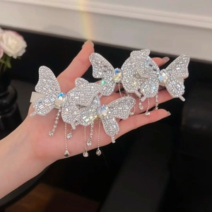 Sparkling butterfly hair clips with crystal tassels and silver rhinestones for women