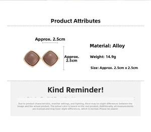 Detail view of geometric square leather earrings with golden metal frames and dimensions