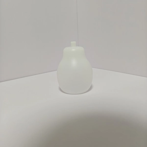Close-up of a pear-shaped frosted translucent plastic lampshade part for DIY decor