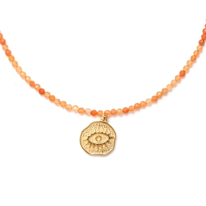 Detail of beaded necklace with golden hammered eye pendant and orange stones
