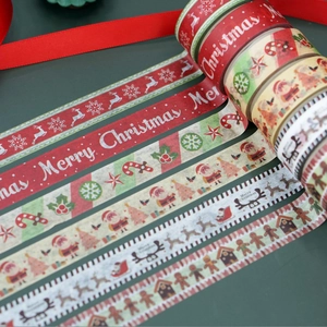 Detail of Christmas washi tape set showing various holiday patterns and vibrant colors