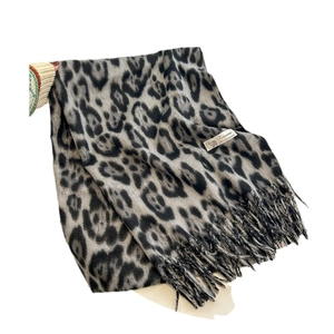 Classic leopard print pashmina scarf with soft cashmere texture and elegant fringe tassels
