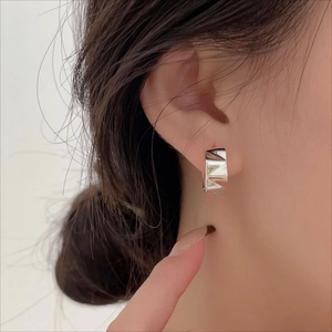 Elegant 925 sterling silver geometric huggie hoop earrings with polished faceted design