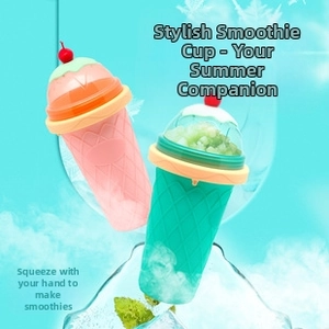 Detail of pink and green squeeze smoothie cups with textured grip and cherry dome lid