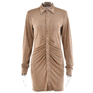 Detail view of brown velvet long sleeve shirt dress with ruched waist and button front