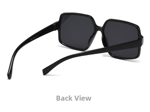 Macro view of oversized square sunglasses interior showing durable frame and size markings