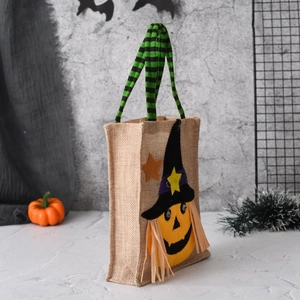 Detail of Halloween burlap gift bag featuring a 3D pumpkin with a wizard hat design