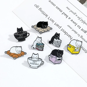 Detailed set of 8 black and white enamel cat pins featuring cats reading and drinking coffee