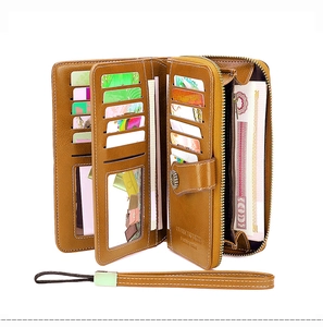 Detail view of large capacity RFID wallet showing card slots and brown leather interior