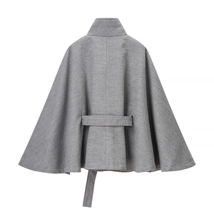 Detail of the high stand collar and textured grey wool blend coat back view