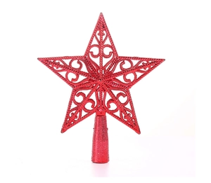 Close-up of red hollowed-out star tree topper with glitter finish on white background