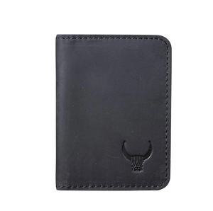 Close-up of black crazy horse leather card holder with embossed bull head logo detail