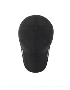 Top view of a black quick-dry baseball cap featuring breathable mesh fabric and side stripes
