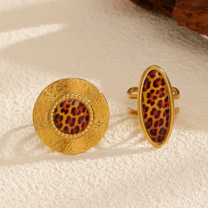 Golden stainless steel 18K leopard print rings with round and oval textured designs
