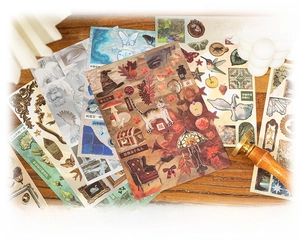 Detail of 30 sheets vintage scrapbooking stickers with cats and mushrooms on wood