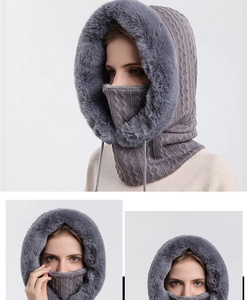 Détail de la cagoule d'hiver gris foncé avec maille torsadée et doublure en fausse fourrure