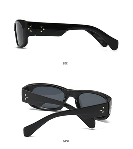 Detailed side and back view of black square sunglasses with golden star rivets