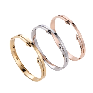 Polished double spear cuff bracelets in gold, silver, and rose gold finishes