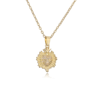 Golden necklace with heart pendant featuring a crown and crystal accents on white background
