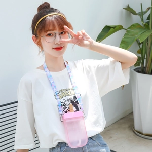 Teenager wearing creative pink popsicle shaped plastic water bottle with geometric strap