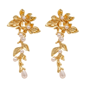 Elegant gold flower and leaf drop earrings with white pearls for a vintage look