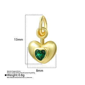 Macro view of 18k gold plated copper heart pendant with green zircon and dimension data