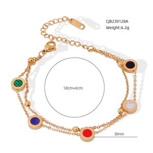 Detail of a gold titanium steel double-layer bracelet with colorful 8mm round charms