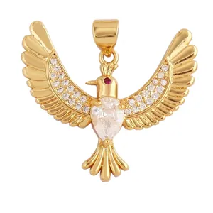 Detailed view of eagle pendant with gold base and white zircons showing size dimensions
