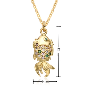 Detailed macro view showing the 22mm by 9mm size dimensions of a gold fish pendant
