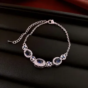 Bracelet vintage français avec saphirs bleus ovales et diamants scintillants en argent