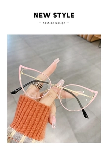 Pink cat-eye glasses frame with gold metal details and engraved temple measurements