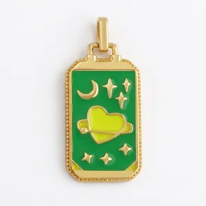 Detail of green tarot pendant with golden crescent and heart motifs in zircon brass