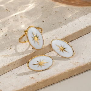 Parure bague et boucles d'oreilles ovales en acier doré avec étoile sur pierre