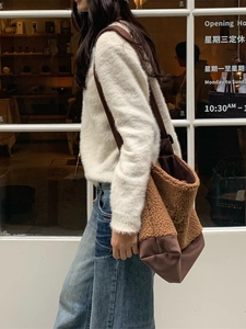 Autumn winter plush tote bag with sherpa fleece and canvas patchwork on female model
