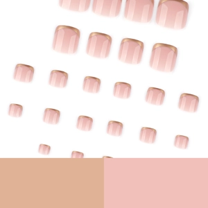 Faux ongles pieds french manucure rose nude avec bord doré, forme carrée courte