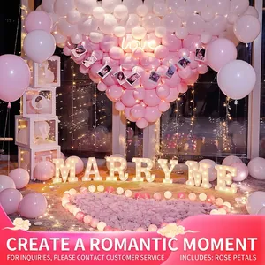 Romantic proposal decoration set with pink heart balloons and Marry Me LED light up letters