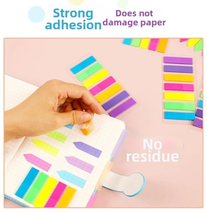 Detailed shot showing easy-to-peel transparent PET index sticky notes on a notebook