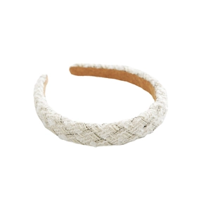 Elegant white tweed headband with gold metallic thread detail on a white background