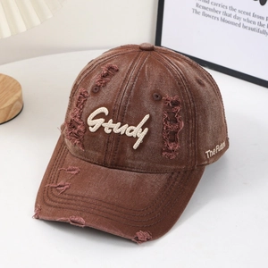 Vintage brown washed cotton baseball cap with Study embroidery and distressed details