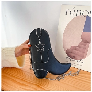 Sac à bandoulière créatif en forme de botte de cowboy noire avec coutures blanches